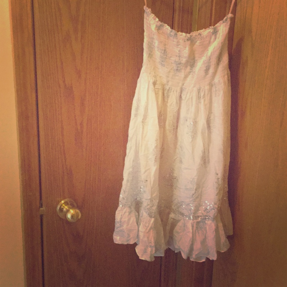 Sleeveless stretchy bathing suit cover up